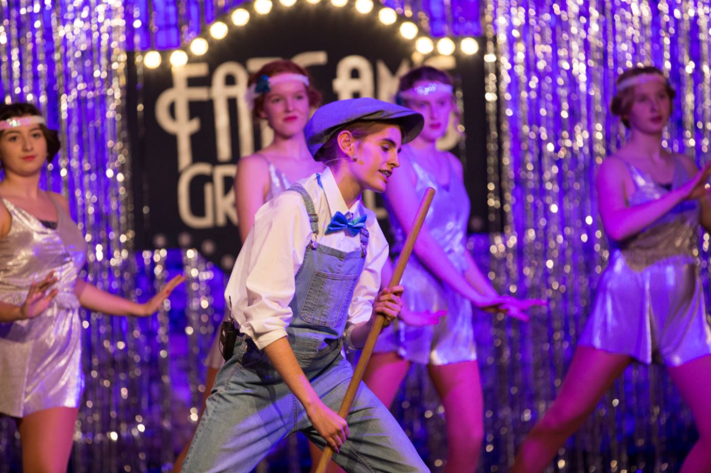 Image of students in school musical to illustrate link to 'Drama and Theatre' page