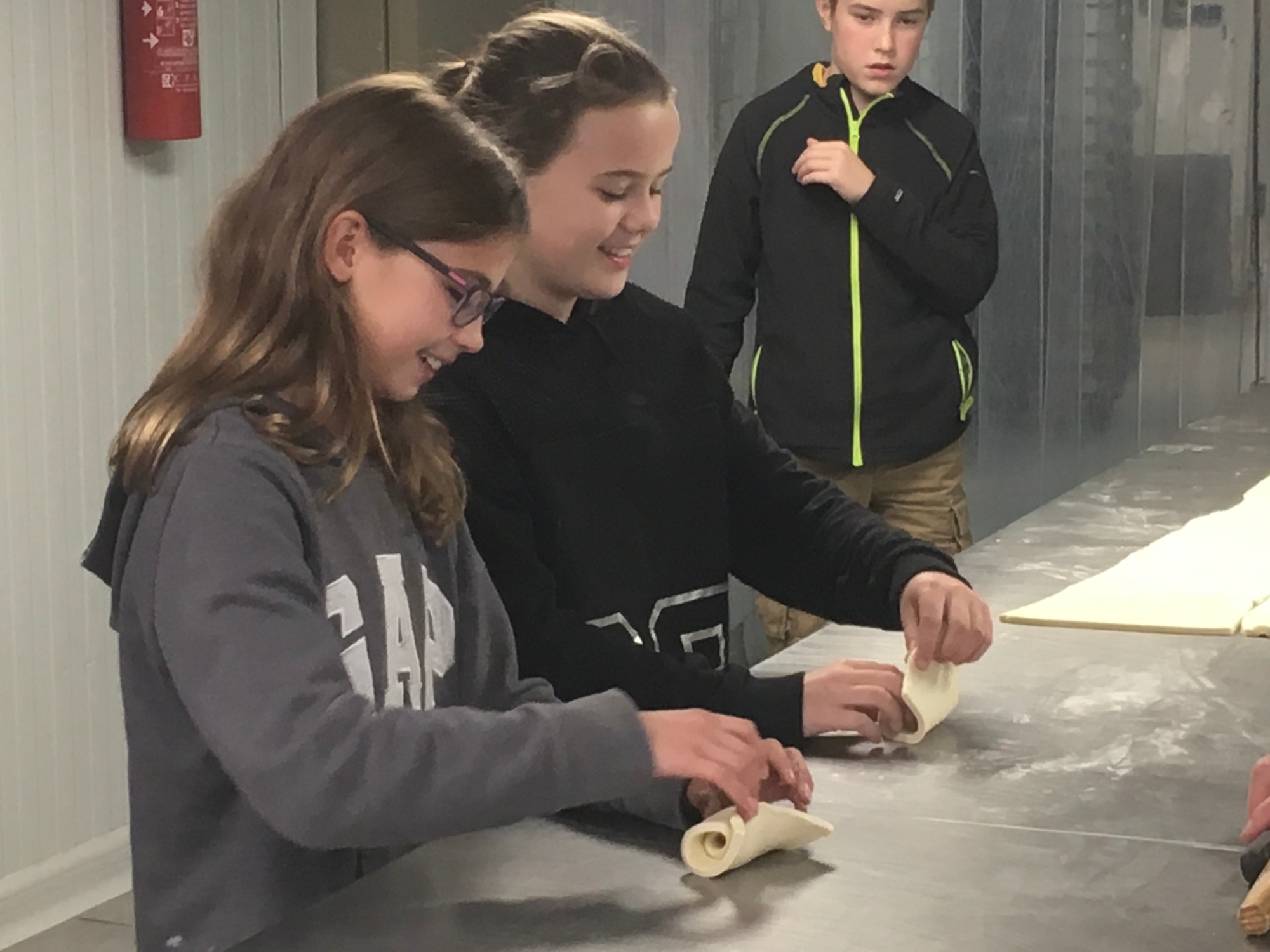 Students make croissants in France