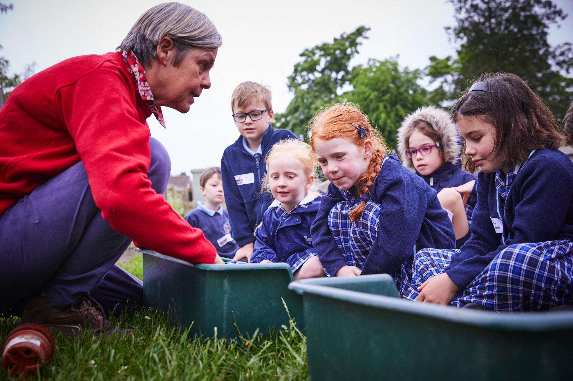 Pupils and teacher doing outdoor learning