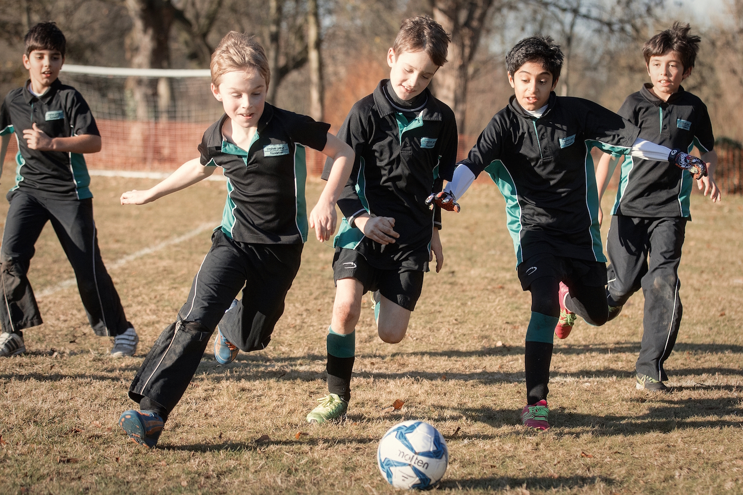 Boys playing football